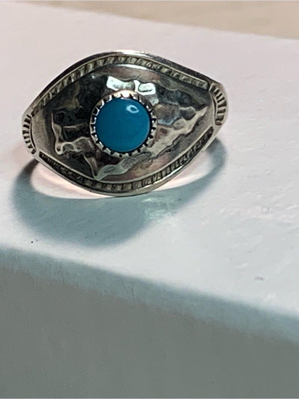 Sterling Silver Ring with Turquoise Cabochon. Marked with makers mark./sterling